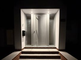 An entrance with a front door and mailbox at Bader House in Ipswich