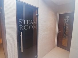 A steam room and spa room entrance at Honeymug in Branton near Powburn