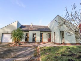 A house with garage and trees at Tig Bhan in Narberth
