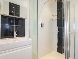 A bathroom with a shower and sink at Gwel An Mor in Portreath