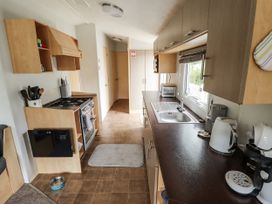A kitchen with appliances and countertops at 31 Castle View in Lincoln
