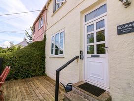A house entrance with a door and steps at Rockside in Salcombe