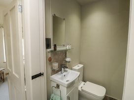 A bathroom with sink and toilet at 13 School Road Newton Abbot