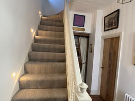 A staircase leading to an upper level at Bohemian Beach Cottage Bournemouth