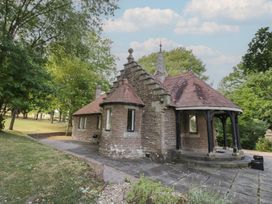A building with a pitched roof and windows at Boxbush Lodge in Monmouth