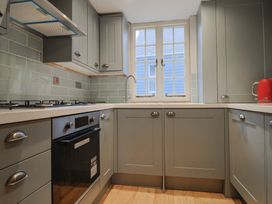 A kitchen with a gas hob and oven at 5B Bridge Street in Lyme Regis