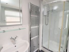 A bathroom with a sink and shower at 5 Jackson Terrace Morpeth