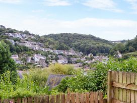A view of houses on a hillside at The Porthole in Newton Ferrers