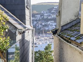 A view of boats in the harbor from a building at 26 Above Town in Dartmouth