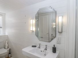 A bathroom with a sink and toilet at 26 Above Town in Dartmouth
