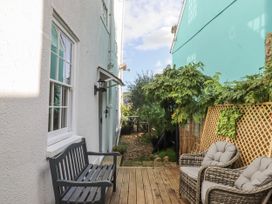 A garden area with a bench and plants at 26 Above Town in Dartmouth