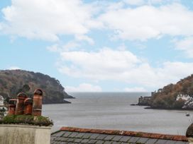 View of a river with hills and clouds at 26 Above Town in Dartmouth