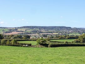 A landscape view with fields and hills at The Dairy in 