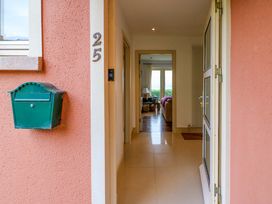 An entrance with a mailbox and hallway view at 25 Ring of Kerry Holiday Cottages Kenmare