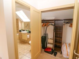 A bathroom with a sink and a toilet at 25 Ring of Kerry Holiday Cottages in Kenmare