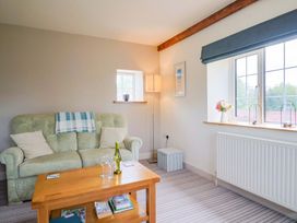 A living room with a sofa and coffee table at The Cottage Middle Westwater Westwater Nr Axminster