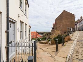 An outdoor view of houses and street at Greenfingers in Whitby