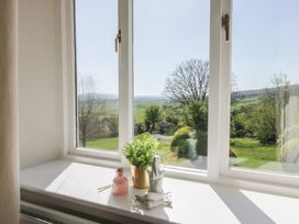 A window with a view of the landscape at Barn Howe in Lyth near Levens