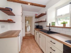 A kitchen with countertop and sink at The Farmhouse in Tralee, County Kerry