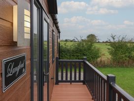 An outdoor area with railing and a view at Langford in Great Hatfield near Hornsea
