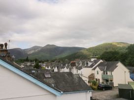 A view of rooftops and mountains at Swirl Howe in Keswick