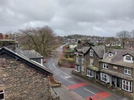 An outdoor view of houses and a road at 1 Park Road Windermere