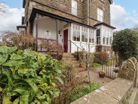 A house entrance with steps and a gate at 1 Park Road in Windermere