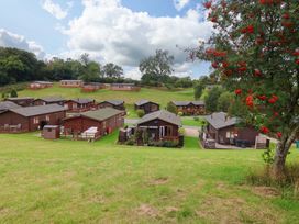 A view of cabins on a lawn at Badgers Retreat - Two Dales in Richmond