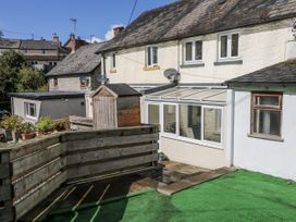 An outdoor area with a house, decking, and shed at Vern Dale Builth Wells