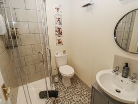 A bathroom with a shower and sink at Vern Dale Builth Wells