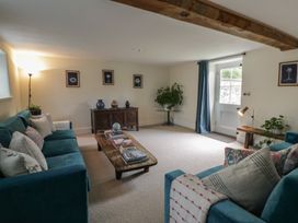 A living room with a sofa and coffee table at West Cottage Myddfai near Llandovery