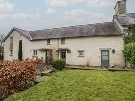 A cottage with windows and doors in the garden at Gatekeepers Cottage Myddfai near Llandovery