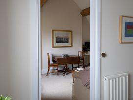 A study with a desk and chair at Gatekeepers Cottage in Myddfai near Llandovery