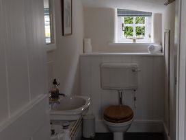 A bathroom with a sink and toilet at Gatekeepers Cottage Myddfai near Llandovery