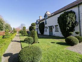 A house with landscaped gardens and topiary at North Cottage Myddfai near Llandovery