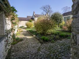 A garden with a pathway and plants at North Cottage in Myddfai near Llandovery