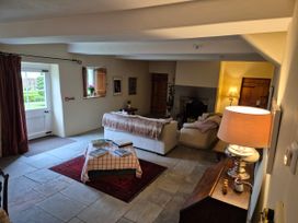 A living room with a sofa and coffee table at North Cottage Myddfai near Llandovery