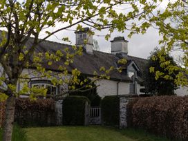 A house with a garden and gate at North Cottage in Myddfai near Llandovery