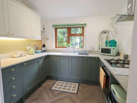 A kitchen with a window and countertop features at Charnwood