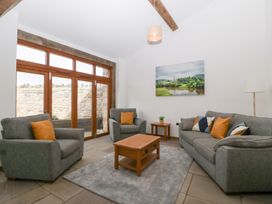 A living room with a coffee table and sofas at Two Parks Barn Upton Bishop near Ross-On-Wye