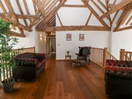 A living room with sofas and armchairs at Two Parks Barn Upton Bishop near Ross-On-Wye