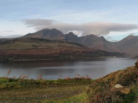 A scenic view of mountains and a lake at The Pod at Greenbank in Kilbride near Broadford