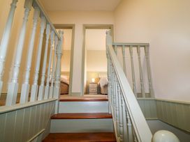 A staircase leading to bedrooms at Shamrock House