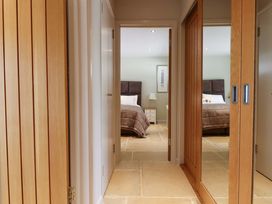 A bedroom with a bed and nightstand at Duke's Barn Blackawton near Dartmouth