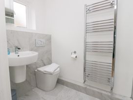 A bathroom with a sink and toilet at Catbells in Windermere