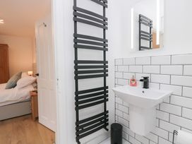 A bathroom with a sink and mirror at Catbells in Windermere