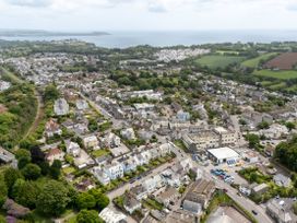 An aerial view of a residential area near the ocean at The Sundial in St Austell