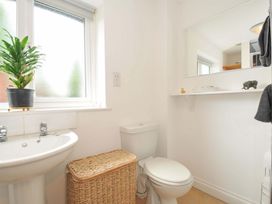 A bathroom with a sink and toilet at Upper Court Cottage Broad Langdon near Wainhouse Corner