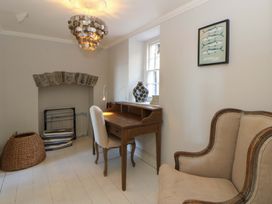 An office with a desk and chair at Zenobia in New Quay