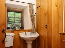 A bathroom with a sink and toilet at Higher Wadden Farm Southleigh
